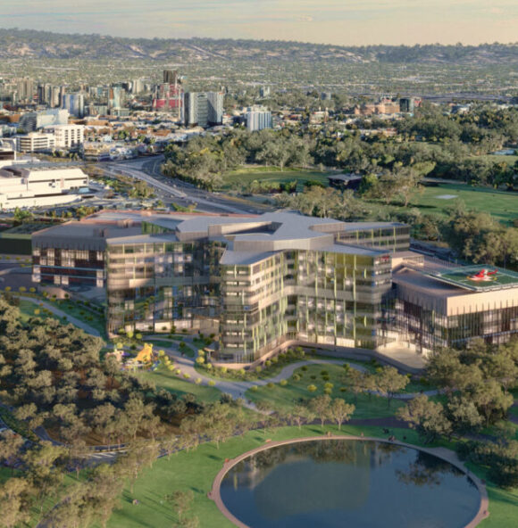 CGI generated image of a large public building set in parklands with urban backdrop.
