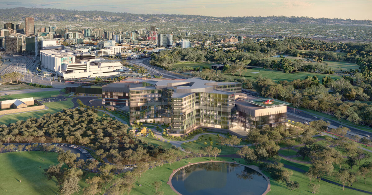 CGI generated image of a large public building set in parklands with urban backdrop.